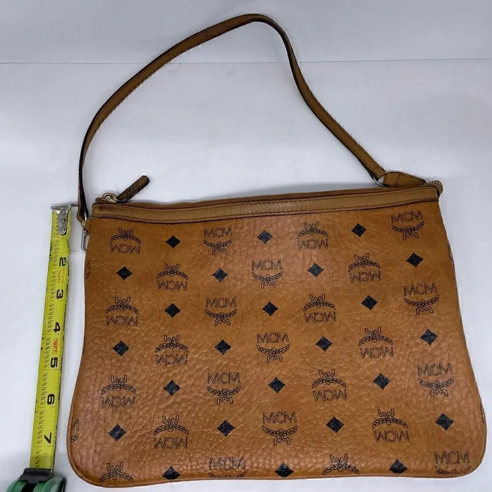 MCM authentic Cognac visetos zip Pouch entrupy COA